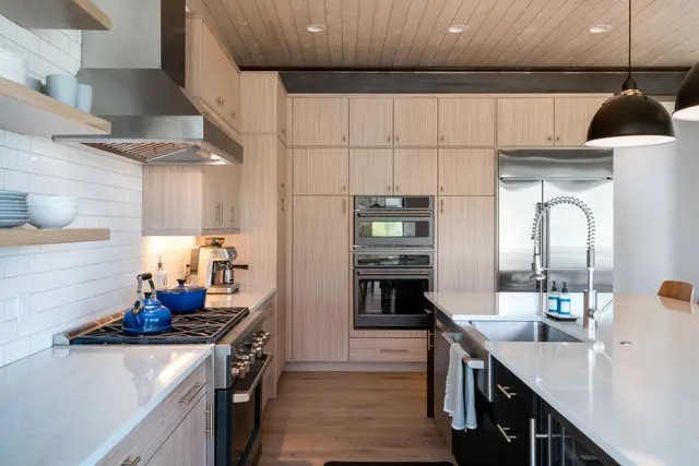 Steamboat bedroom with layered neutral textiles