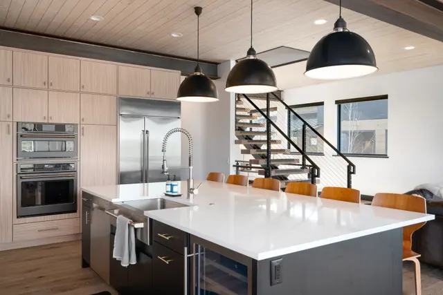 Steamboat bathroom with natural stone and warm wood
