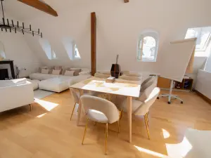 Haussmann-Style Loft with City Views in Paris's Golden Triangle