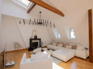 Haussmann-Style Loft with City Views in Paris's Golden Triangle