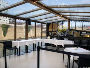 Glass-Roofed Restaurant with Natural Light in Paris