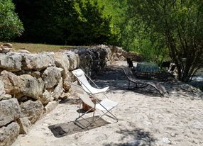 Large swimming pool in a green setting