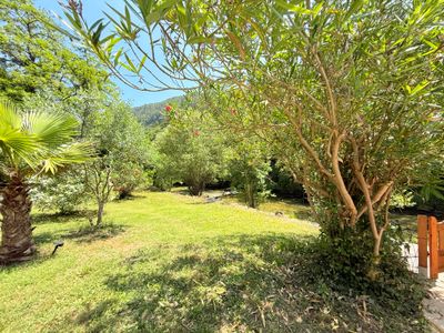 Large swimming pool in a green setting