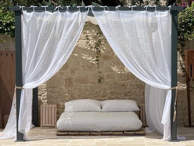 Stone house and vegetarian guest table