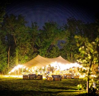 Restaurant installed under a tent in a pear orchard in Avignon