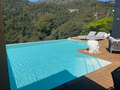 Mountain view terrace with infinity pool not overlooked