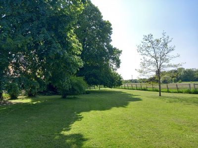 Longère with 10,000 m² of field and orchard