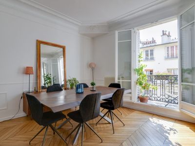 Haussmannian apartment with balcony and Eiffel Tower view