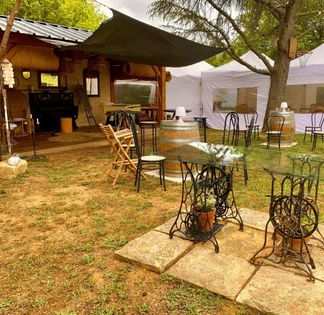 Garden with swimming pool and outdoor kitchen