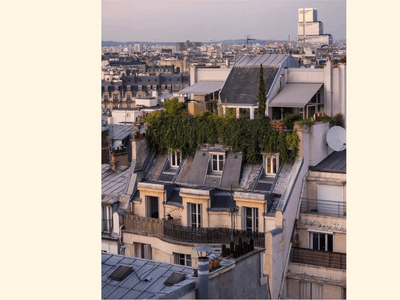 Paris terrace with Arc de Triomphe and Eiffel Tower sky view 