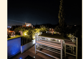 Paris terrace with Arc de Triomphe and Eiffel Tower sky view 