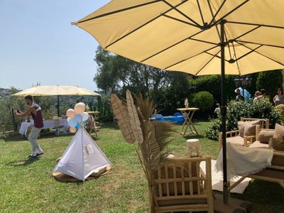 Garden with swimming pool and view of St Paul and the hills of Vence