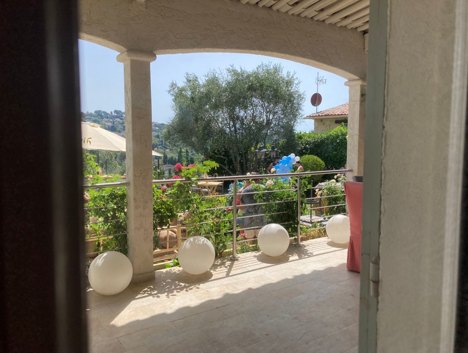 Garden with swimming pool and view of St Paul and the hills of Vence