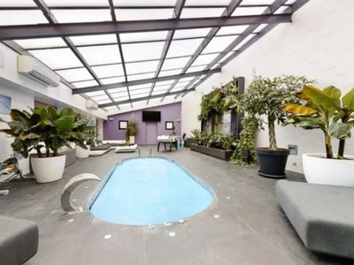 Luxurious loft - pool/spa, garden, cinema room and high-end entertainment