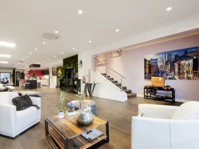 Luxurious loft - pool/spa, garden, cinema room and high-end entertainment