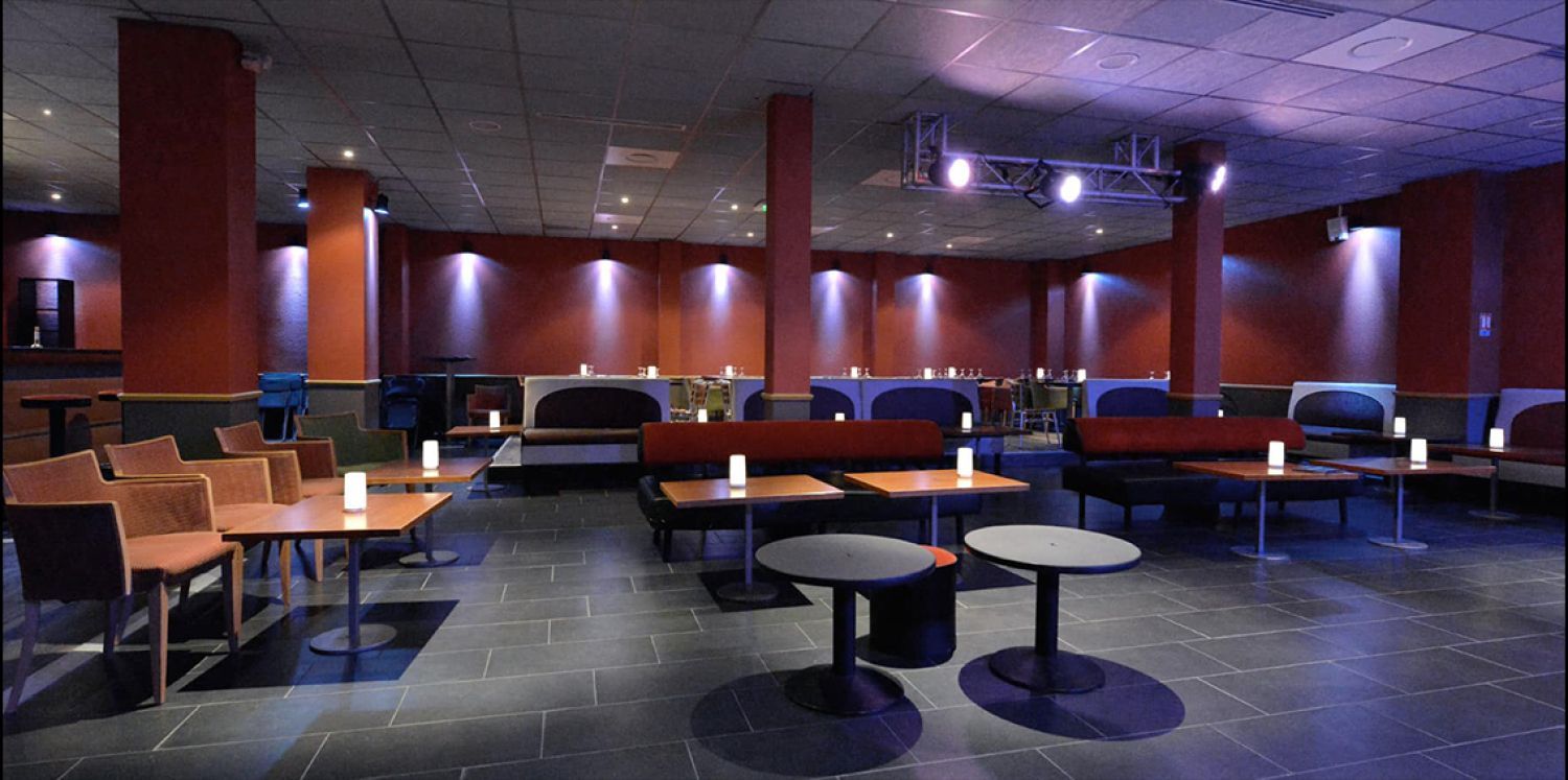 Jazz club with large bar and equipped stage