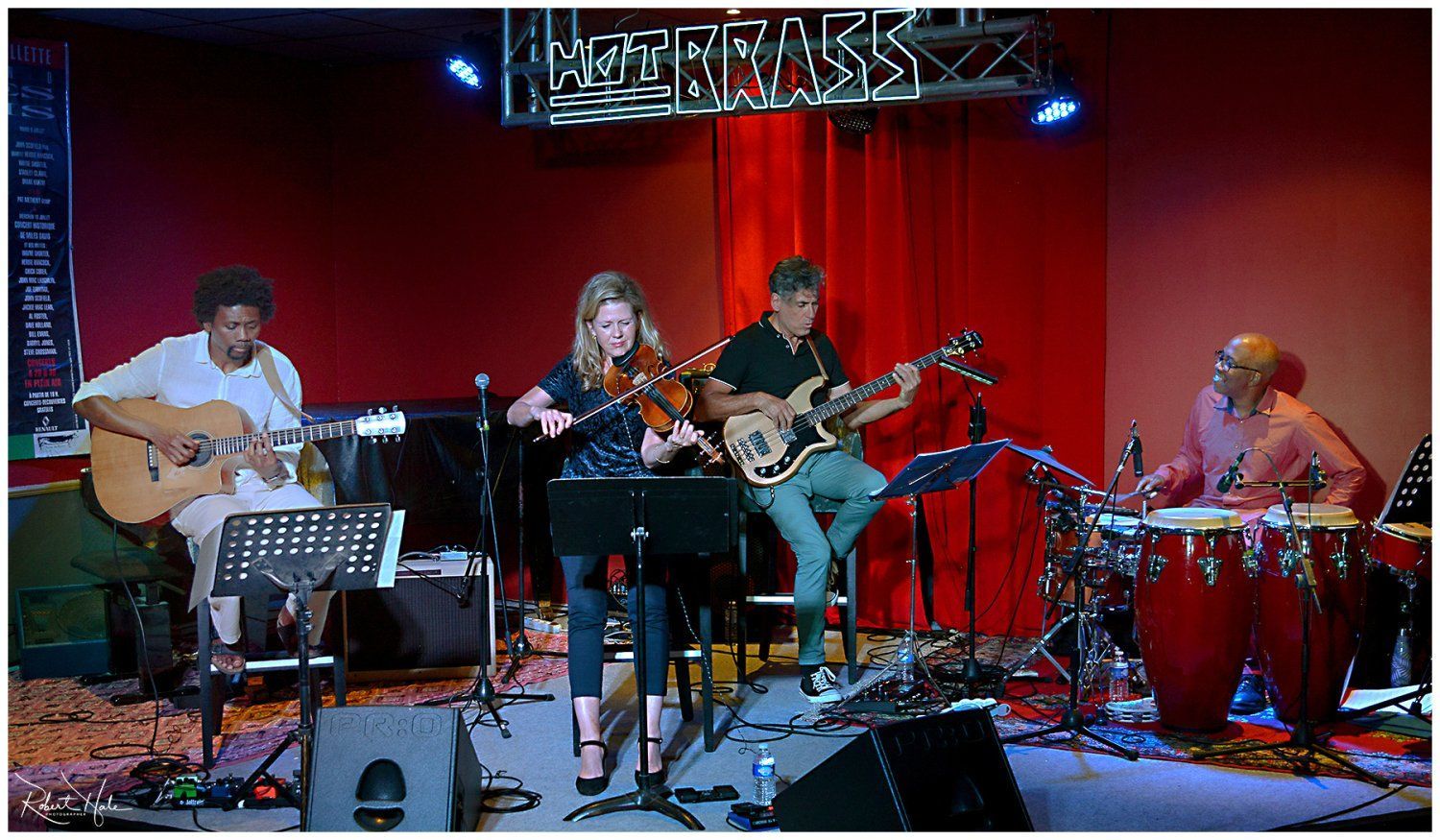 Jazz club with large bar and equipped stage
