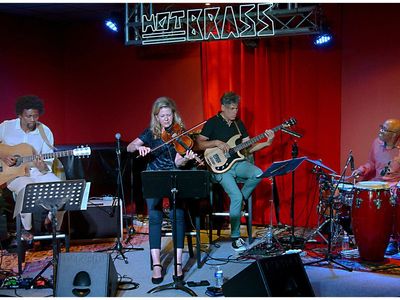 Jazz club with large bar and equipped stage