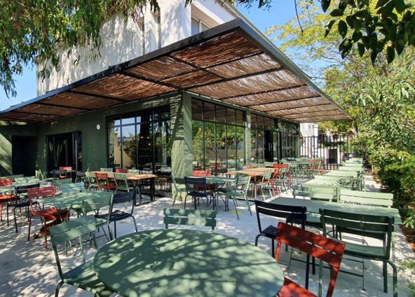 Spacious modern restaurant with a pretty green patio