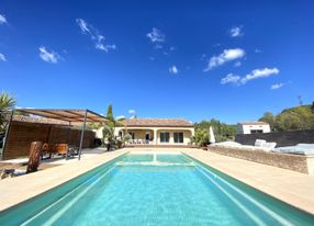 Villa with a swimming pool and a large garden