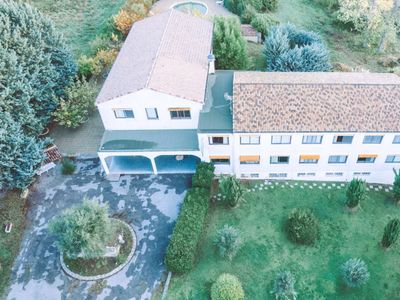 Hotel reception area with a swimming pool