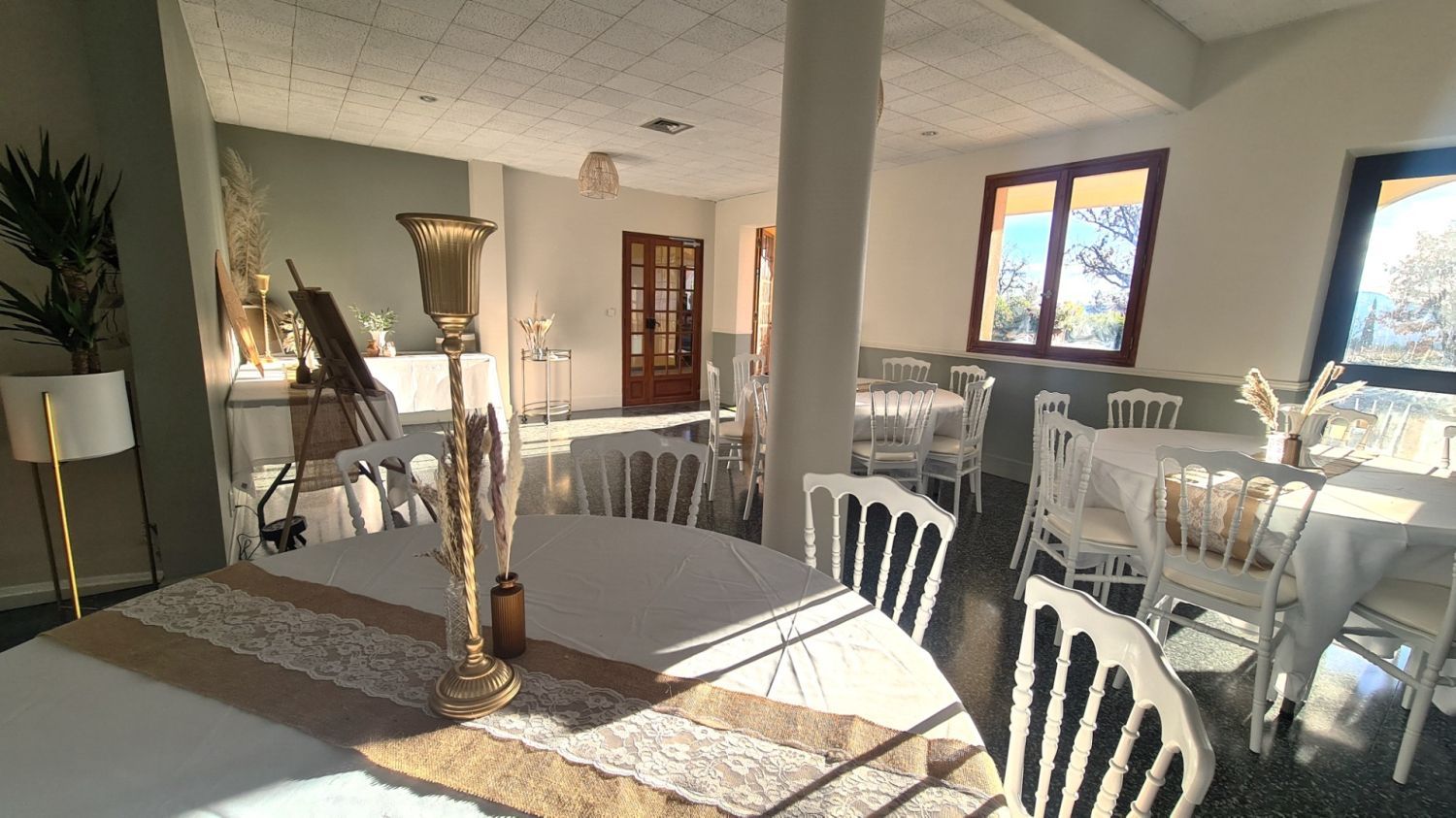 Hotel reception area with a swimming pool