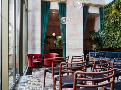 Elegant Parisian Venue with Glass Roof & Green Wall for Events