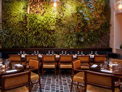 Elegant Parisian Venue with Glass Roof & Green Wall for Events