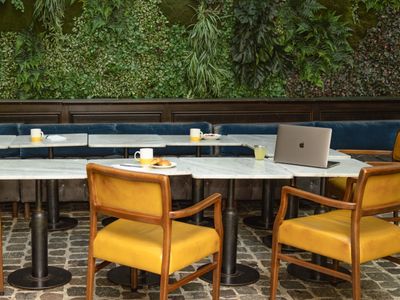 Elegant Parisian Venue with Glass Roof & Green Wall for Events