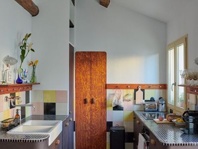 Building that can be privatized, with terrace, renovated by architect 