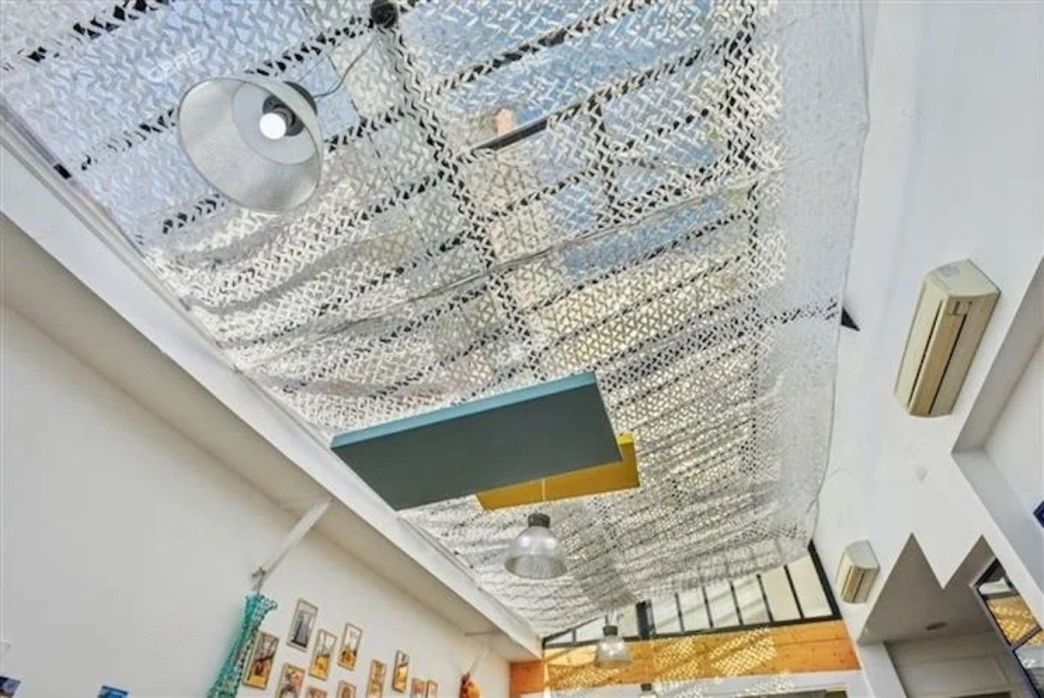 Workshop office with bright kitchen, glass roof, meeting rooms and large reception area