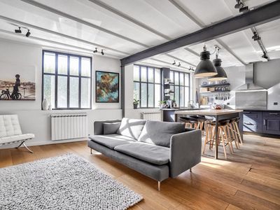Large industrial Eiffel loft, steel, brick and glass roof