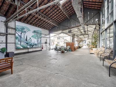 Large industrial Eiffel loft, steel, brick and glass roof