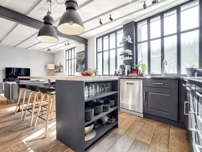 Large industrial Eiffel loft, steel, brick and glass roof
