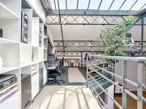 Large industrial Eiffel loft, steel, brick and glass roof