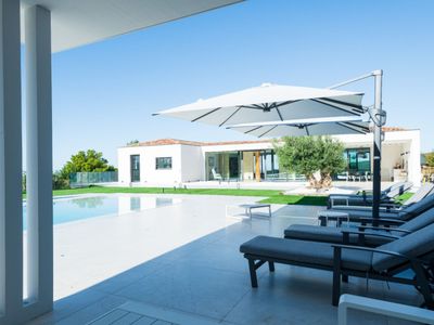 Luxurious villa with sumptuous mirror pool