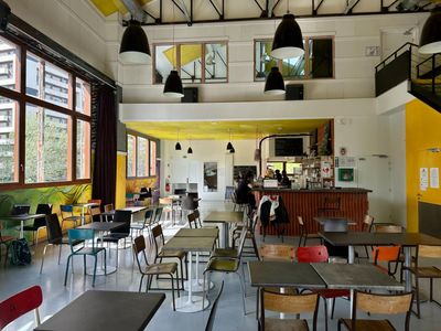 Reclaimed Railway Hall in Paris 19th: A Solidarity Event Space