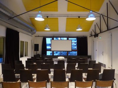 Reclaimed Railway Hall in Paris 19th: A Solidarity Event Space