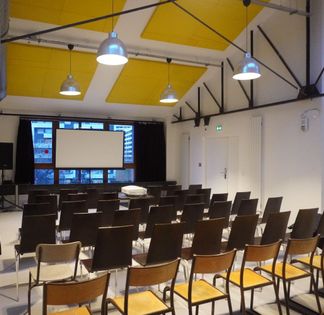 Reclaimed Railway Hall in Paris 19th: A Solidarity Event Space