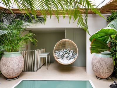 Luxury Triplex Retreat Near Arc de Triomphe with Terrace & Hammam