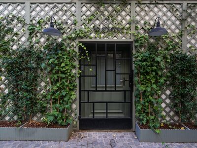 Luxury Triplex Retreat Near Arc de Triomphe with Terrace & Hammam