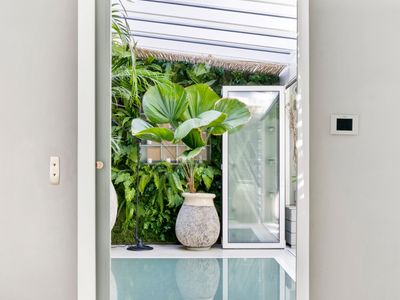 Luxury Triplex Retreat Near Arc de Triomphe with Terrace & Hammam