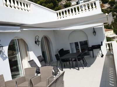 The white villa overlooking the bay