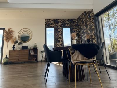 Contemporary house with hill views