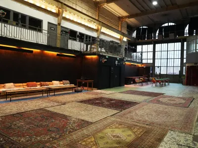 An industrial room equipped for all types of meetings and events