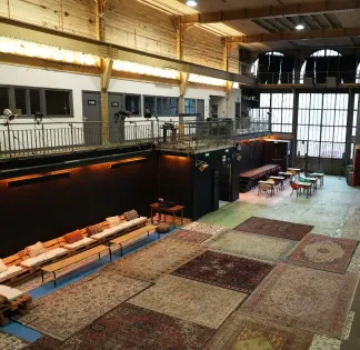 An industrial room equipped for all types of meetings and events