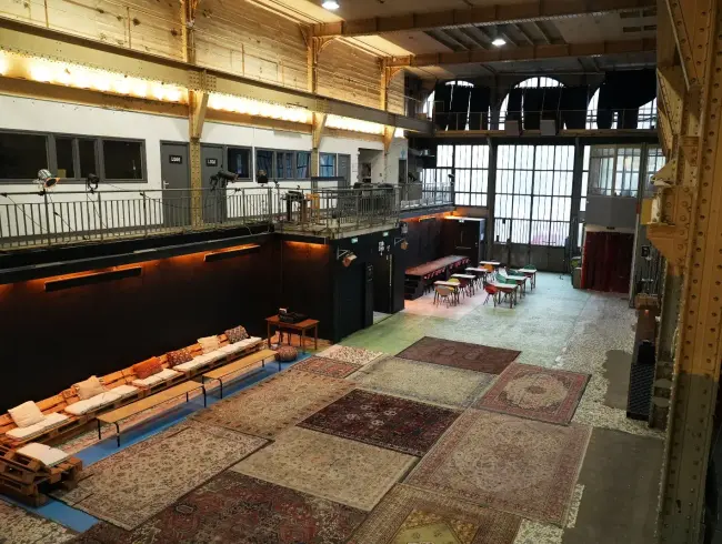 An industrial room equipped for all types of meetings and events