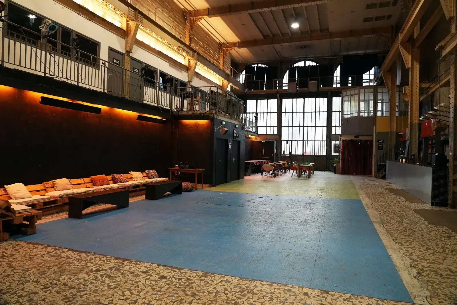 An industrial room equipped for all types of meetings and events