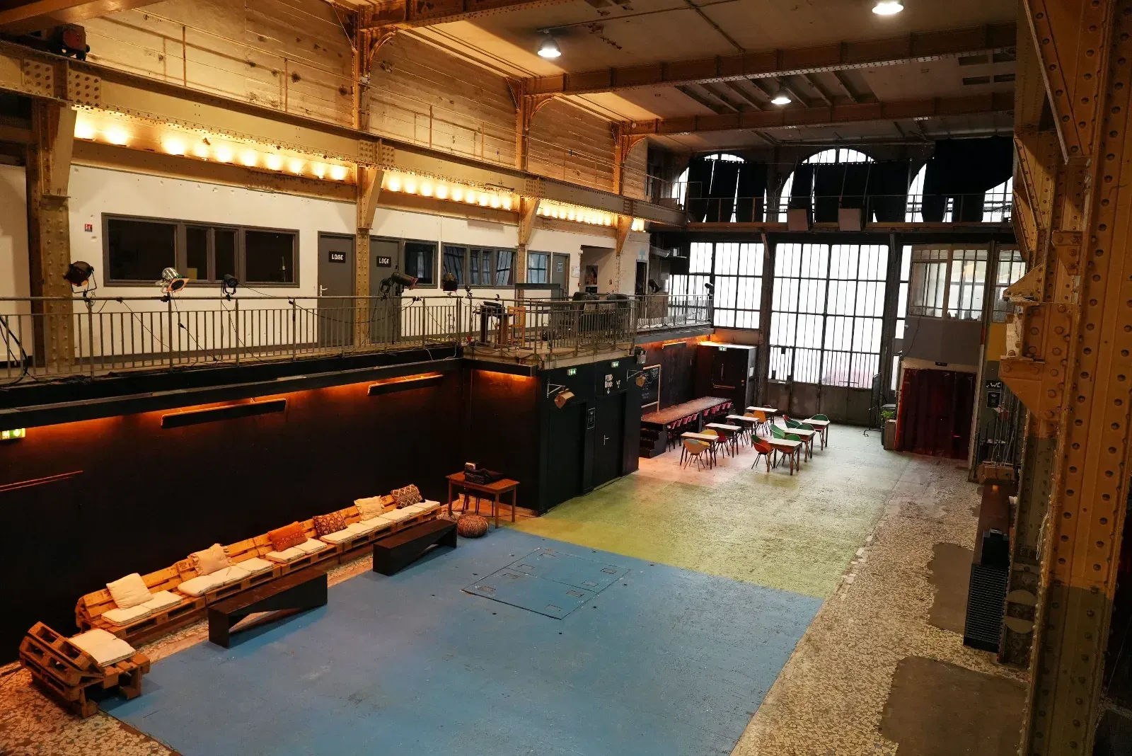 An industrial room equipped for all types of meetings and events