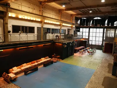 An industrial room equipped for all types of meetings and events